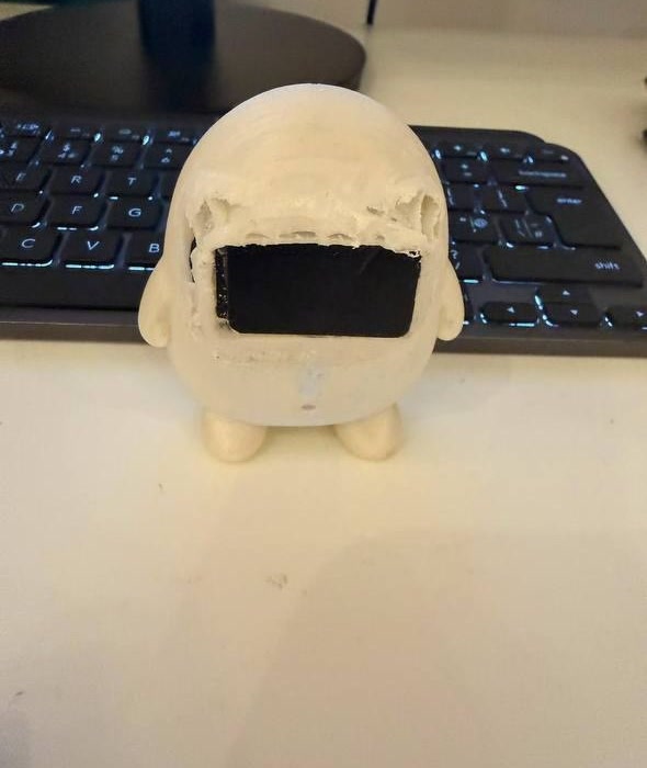 The first 3D print of Lumi on a desk